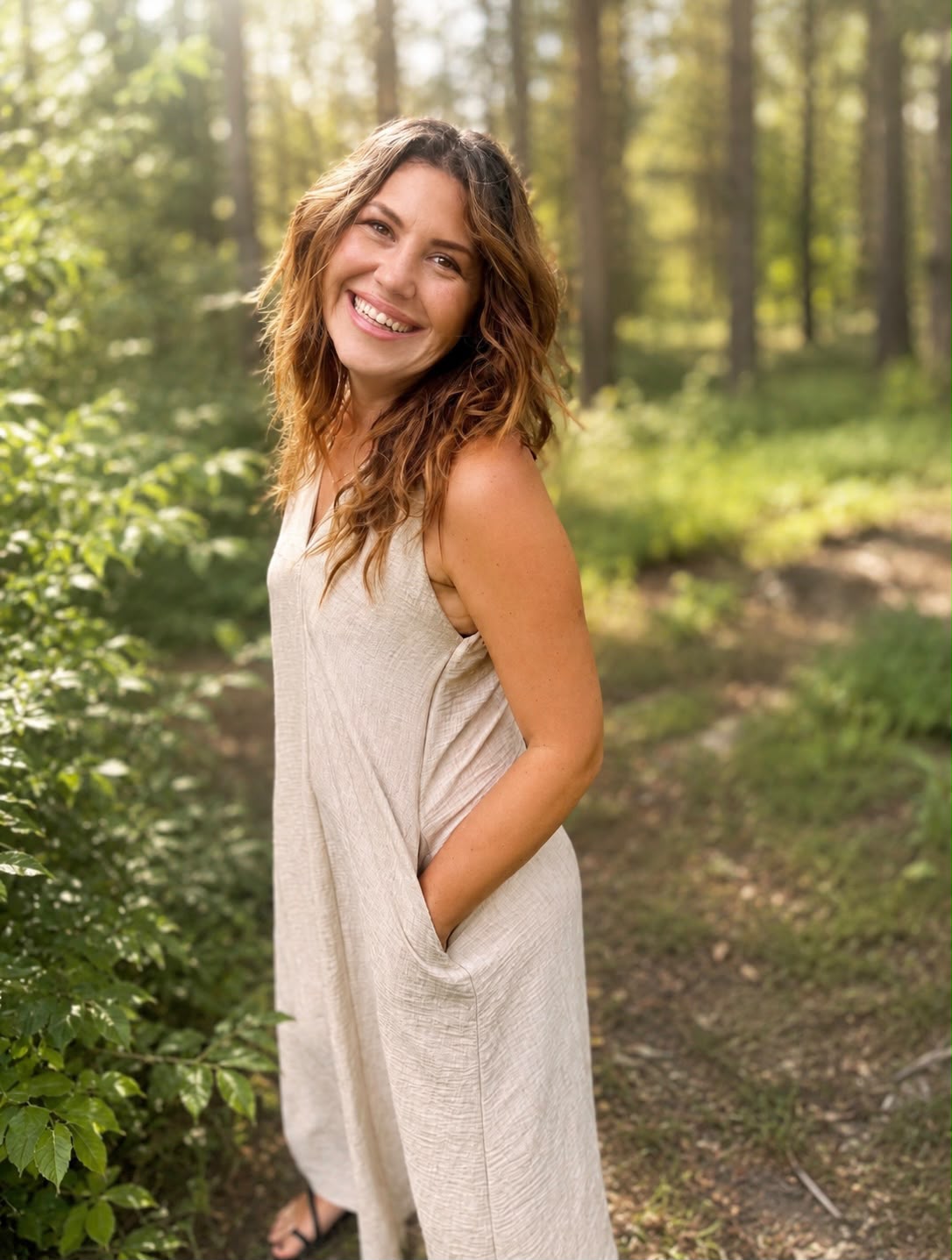 Melissa Phillips, founder of North Channel Co, on a sunlit wooded trail